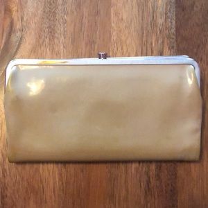 HOBO Lauren clutch - Like new!  Patent tan leather